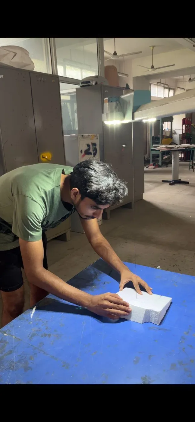 Sanding the foam prototype