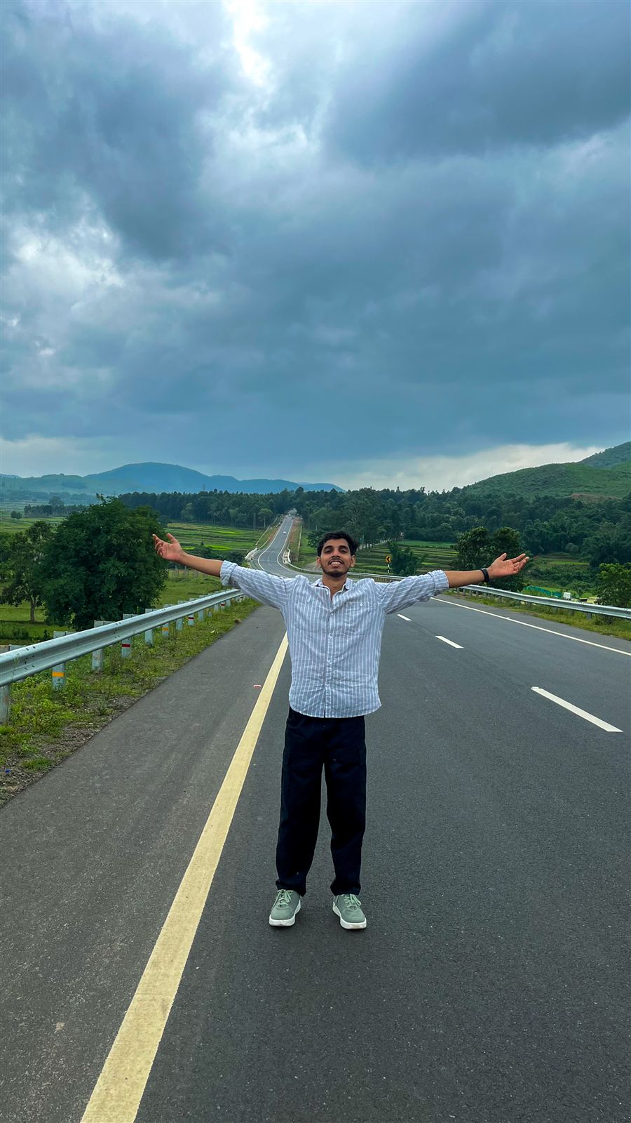 Pradyumn on an open road with arms wide open
